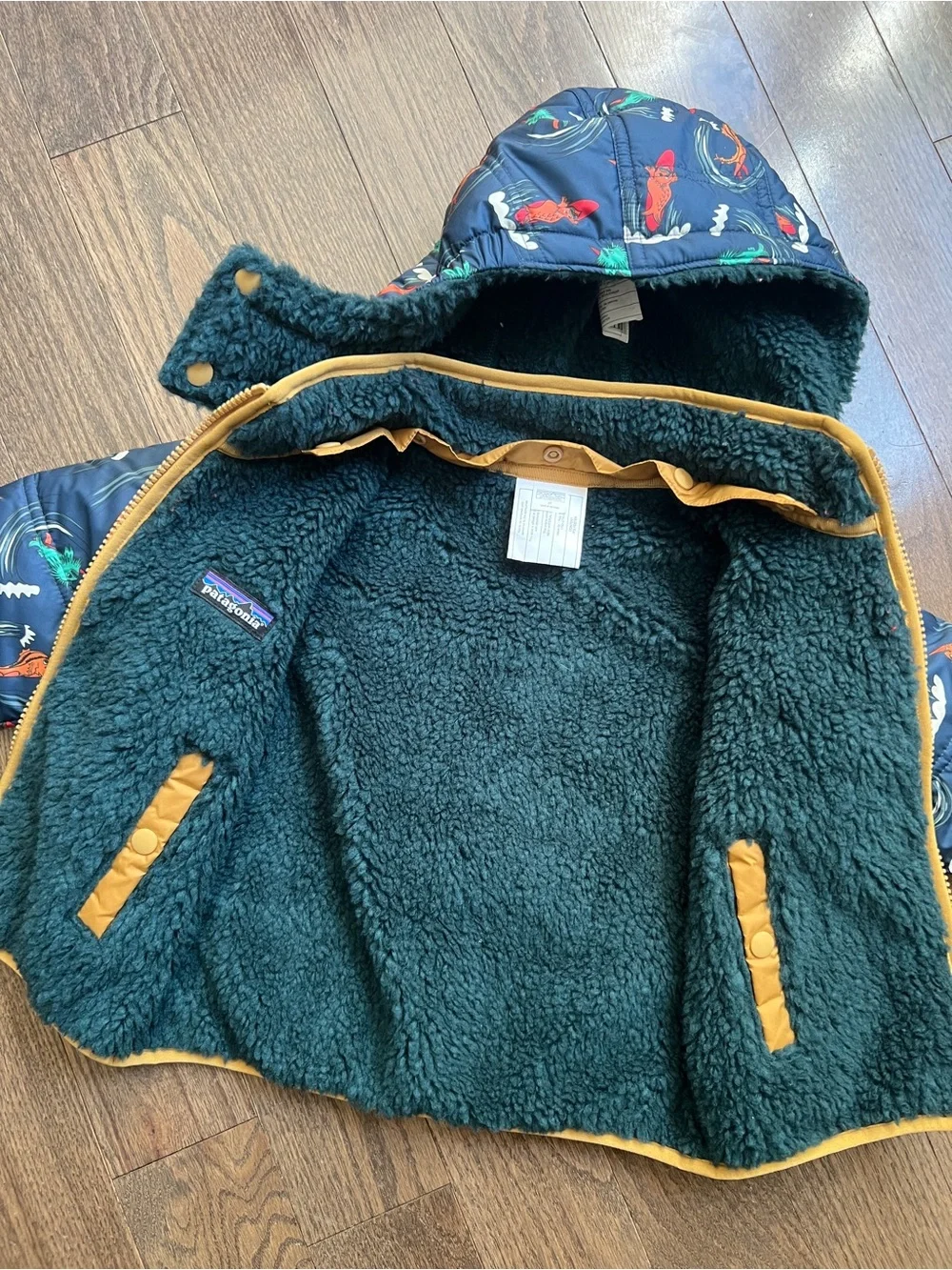 Patagonia Navy Surf Print Reversible Tribbles Jacket with hood size 2T